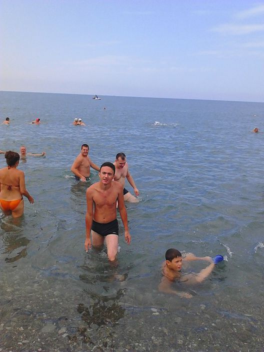 На море