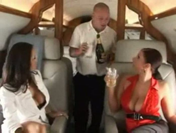 Busty Babes Getting Down on a Plane