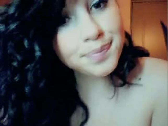 Cute brunette posing on webcamera