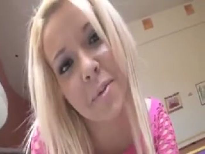 Young blonde demonstrates her petite ass