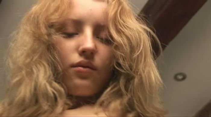 Blonde masturbates in toilet